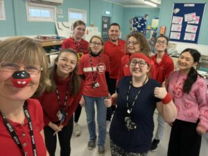 group photo of staff on red nose day at Jigsaw