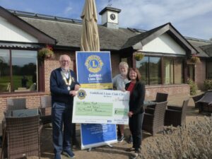 photo of cheque presentation from Guildford Lions Club